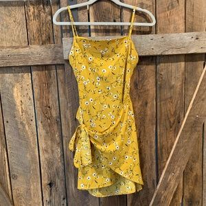 Yellow floral spaghetti strap wrap dress